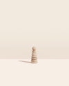 Stacking Ring on a cream background.