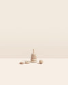 Stacking Ring on a cream background.