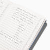 Close up of the Everyday Notebook in To Do open with writing on it.