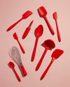 The GIR Red 10 Piece Best Seller Set on a peach background.