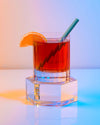 A GIR Cocktail Straw in Geode on a coloful background.