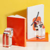 Acrylic Arc Bookends on a yellow background holding up two books.