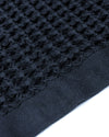 Close up of the Onsen Twilight Blue Waffle Bath Towel.
