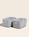 2 Open Spaces Large Felt Storage bins on a cream background.
