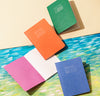 The different Everyday Notebook in Dotted on a colorful background.