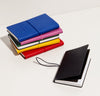 Different colors of the Simple Planners on a white background.