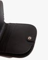 Close up of the inside of the Poketo Dome Wallet in Black on a white background.