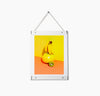 The Acrylic Poster Hanger in Small holding up a Picture on a white background.
