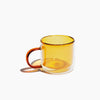 The Amber Double Wall Mug on a white background.
