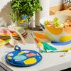 The Bamboo Servers set amongst other Poketo products on a grayish countertop.