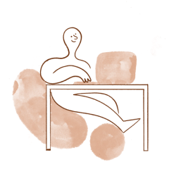 A cartoon figure working on a lap top
