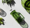 A Verde Glass French Press with a clear Double Wall Glass behind it.
