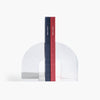 Acrylic Arc Bookends on a white background holding up two books.