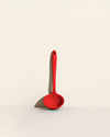 GIR Ultimate Ladle in Red on a cream background.