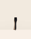 The GIR Black Ultimate Basting Brush on a cream background. 