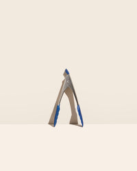 GIR Tongs on a cream background.