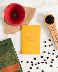 Coffee Passport on a themed background