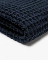 Close up of the Onsen Twilight Blue Waffle Bath Towel.