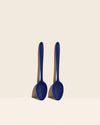 GIR Ultimate and Perforated Spoon set on a cream background.