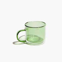 The Green Double Wall Mug on a white background. 