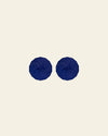GIR Suction Lid in Navy on a cream background.